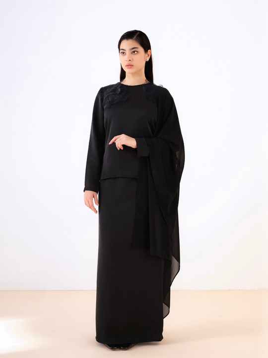 Anya         in             Black