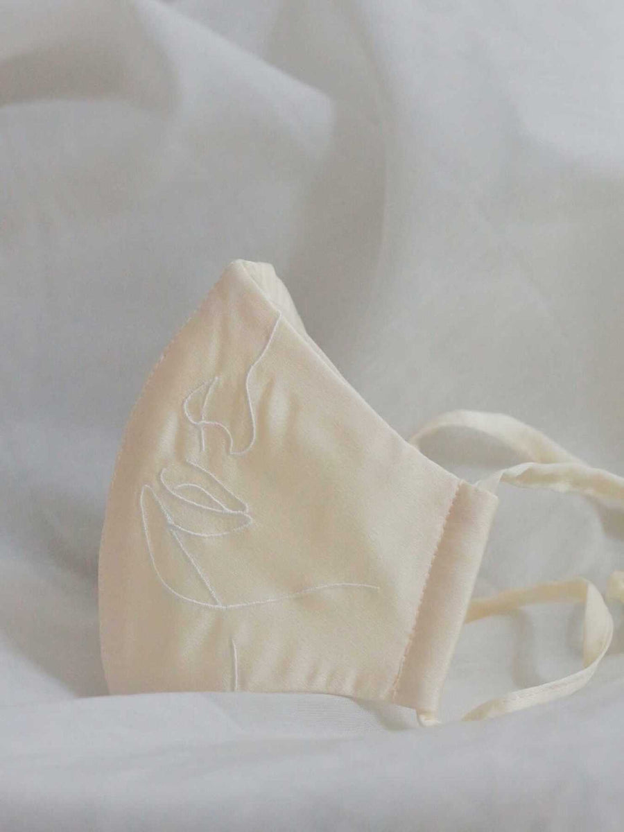 4-ply: Hanya Embroidered Face Mask with String Extension in Champagne